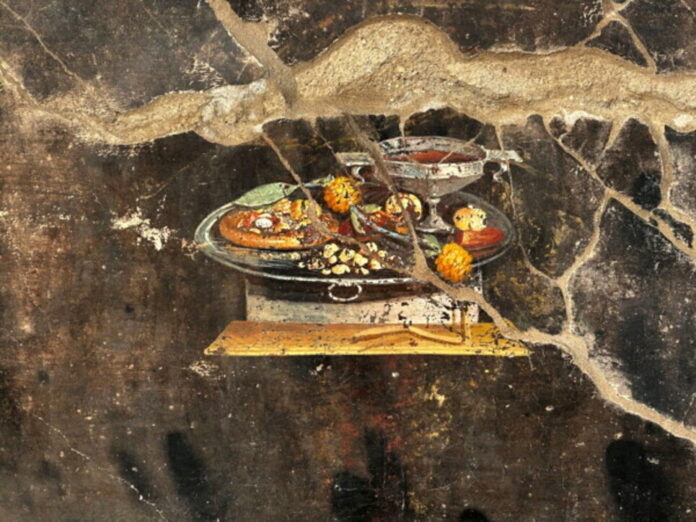 Un antenato della pizza in natura morta scoperto a Pompei